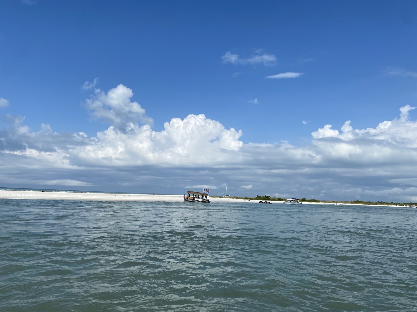 The Hemingway
      shuttle approaches Keewaydin Island from the south.